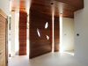 custom-entry-door-honed-limestone-floors-and-brazilian-cherrywood-floors